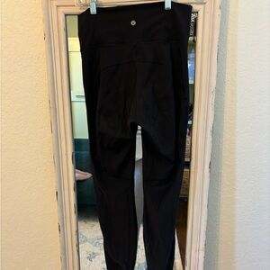 Lululemon black leggings with mesh on calves and ankle
